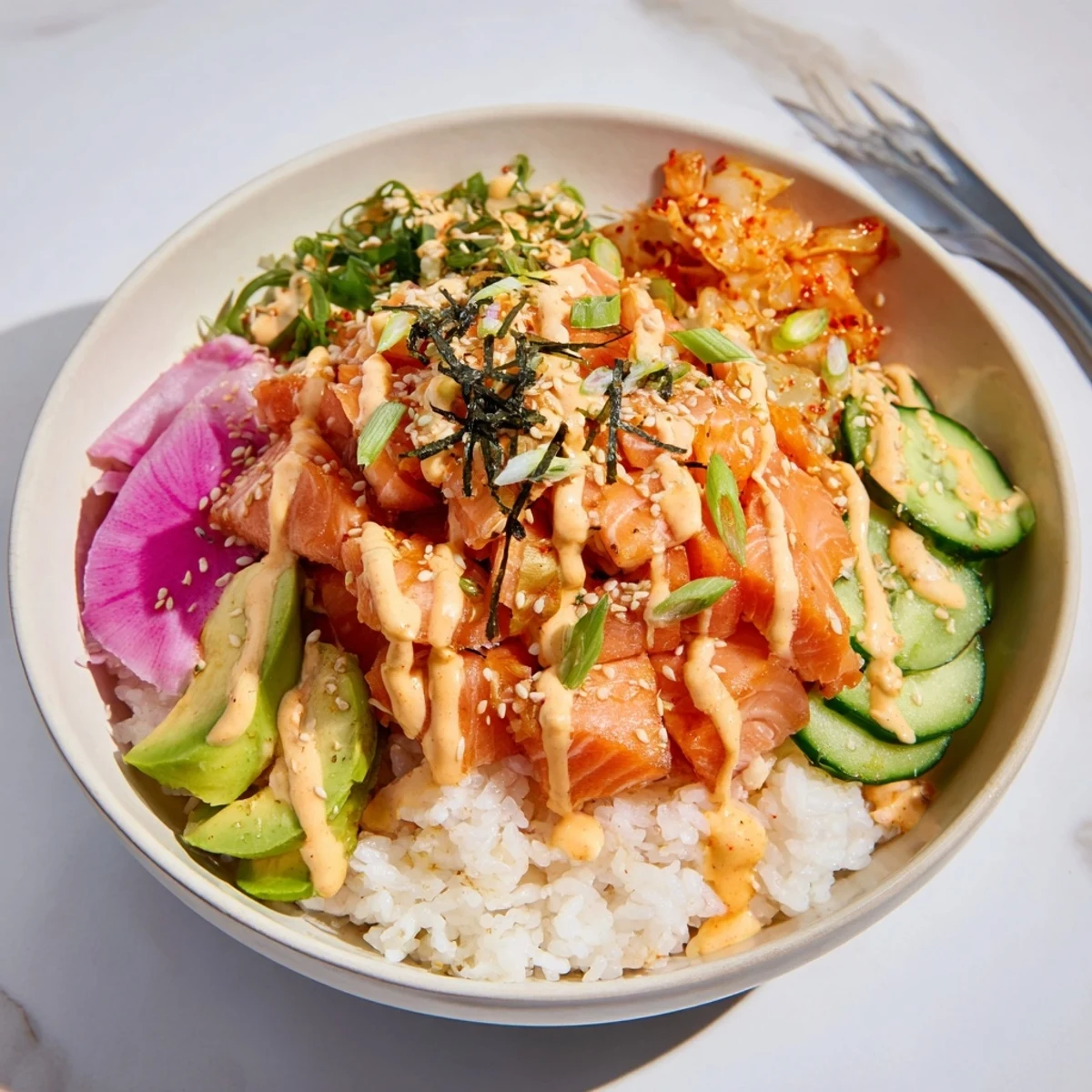 Vibrant Crispy Salmon Rice Bowl showcasing golden rice and crunchy garlic garnishes.  