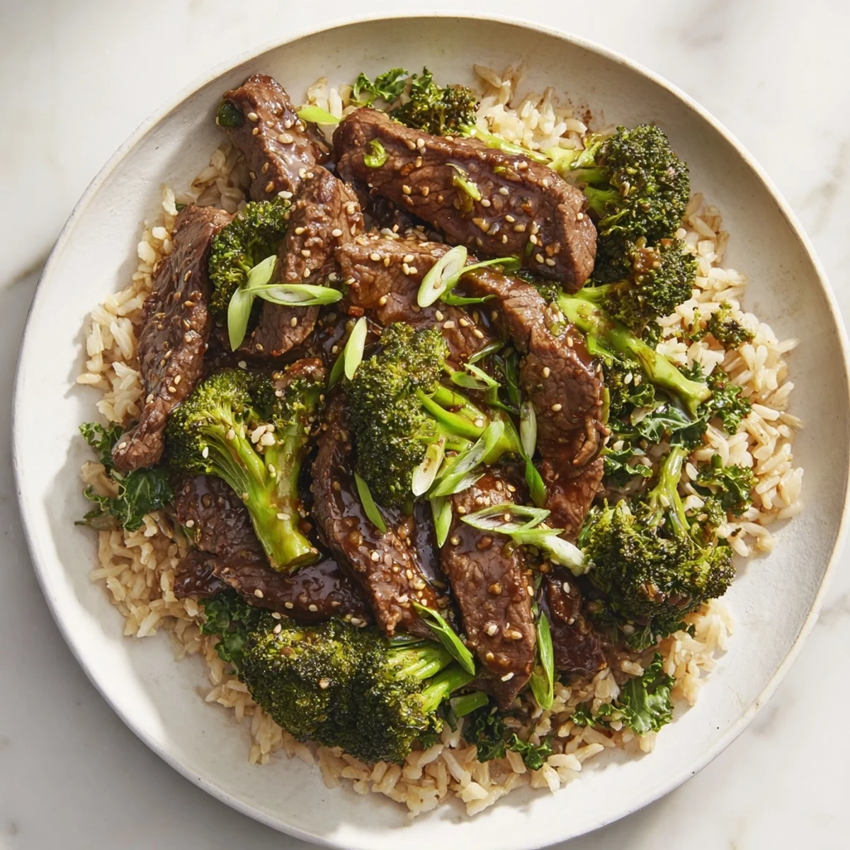 Steam rises from this Slow-Cooker Beef & Broccoli, a hearty meal of tender meat and rice.