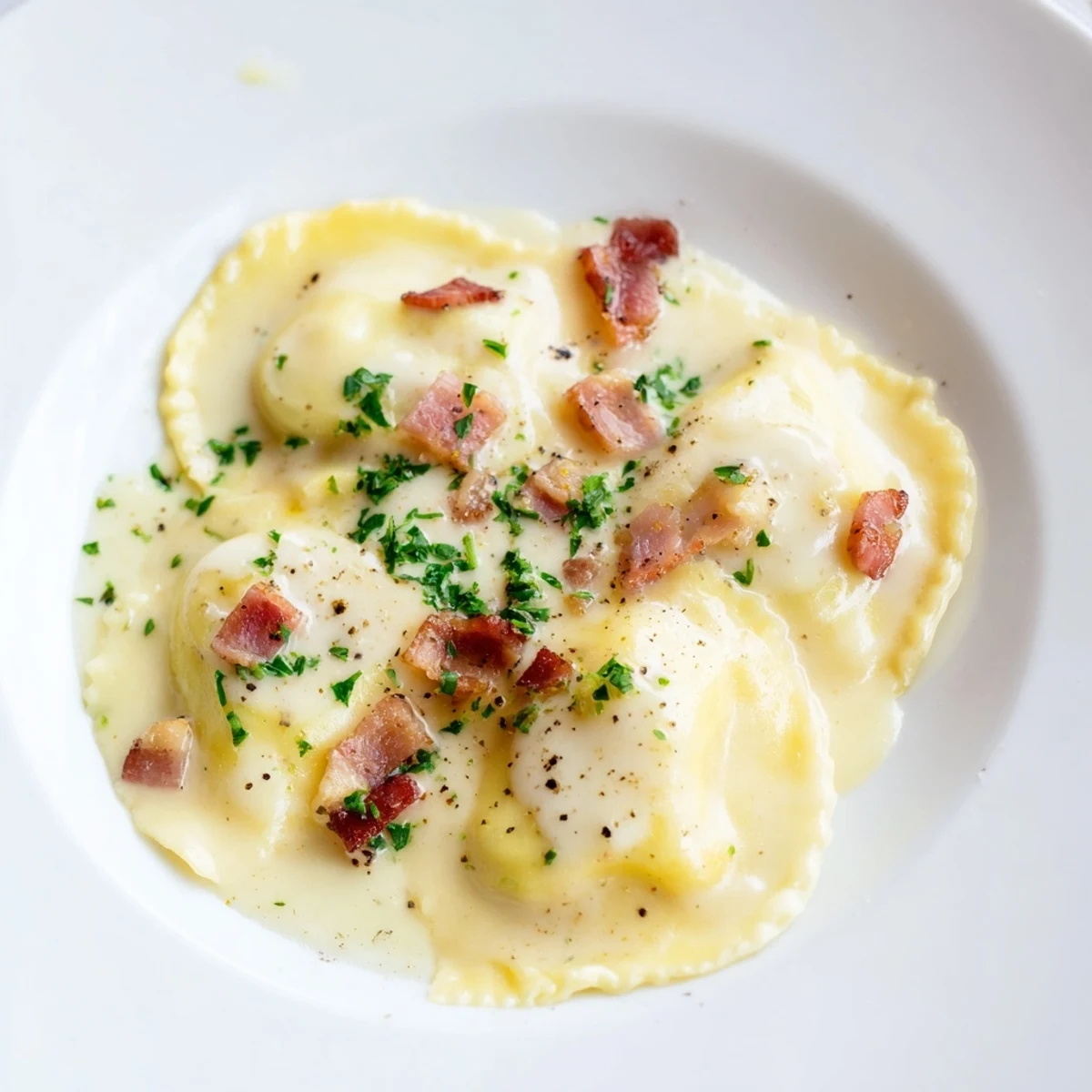 Creamy Olive Garden Ravioli Carbonara with crispy pancetta, perfect for a comforting Italian meal.