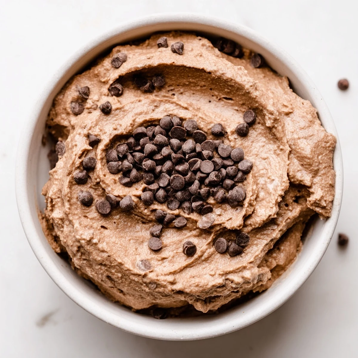 This decadent brownie batter dip is gluten-free, inviting you to easily scoop and enjoy.