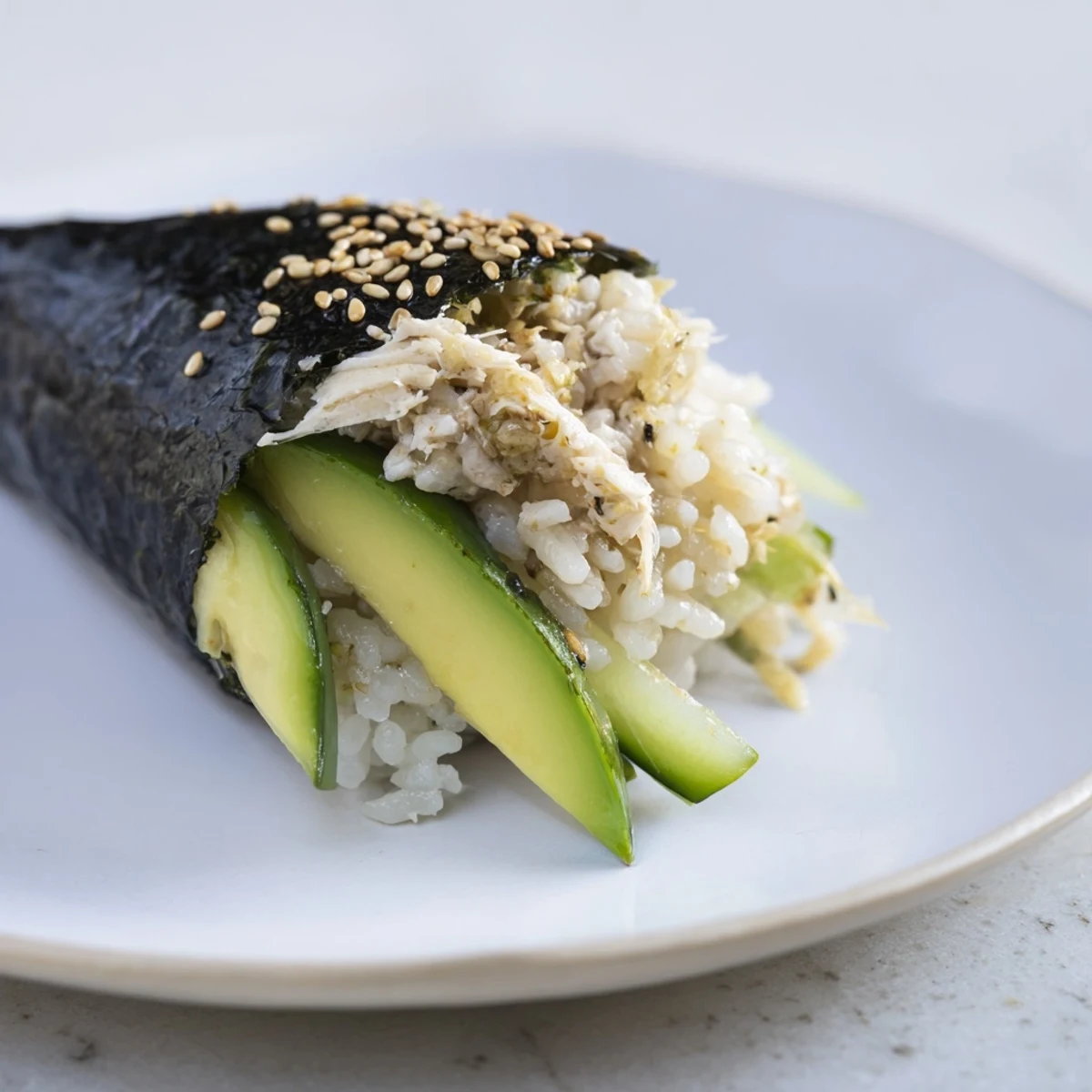 A close-up of delicious Sushi Rice Hand Rolls with colorful fillings and crisp seaweed wrappers.