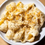 Golden-brown Easy Tinis Mac & Cheese with a crusty breadcrumb topping, perfect comfort food.