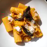 Golden roasted butternut squash coats the pasta, mixed with tangy goat cheese in this flavorful dish.