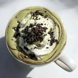 A close-up of a vibrant Matcha Hot Cocoa Protein Mug ready for a quick and nutritious breakfast.