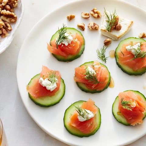 A festive platter of champagne pairings showcasing smoked salmon, brie, and delicious appetizers.