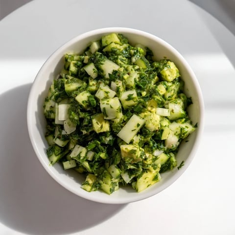 Creamy Green Goddess Cabbage Dip, brimming with fresh vegetables, served with crisp tortilla chips.