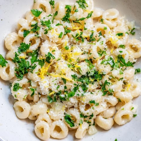 A close-up of the delicious 15-Minute Creamy Garlic Butter Ditalini, ready to be served hot.